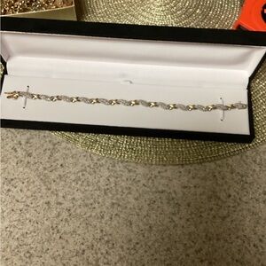 Elegant Gold and Silver Diamond Bracelet.